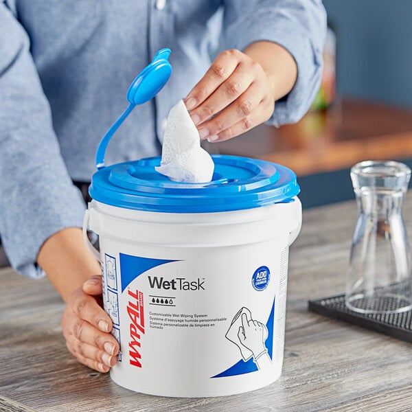 A blue bucket of WypAll CriticalClean wet wipes.