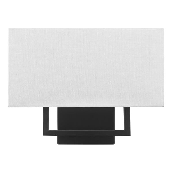 A black rectangular wall sconce with a white rectangular lamp shade.