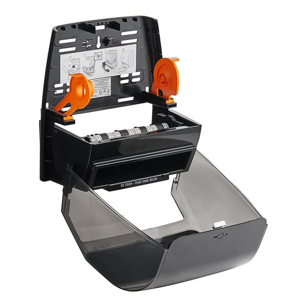 A black and orange Scott Slimroll automatic paper towel dispenser.
