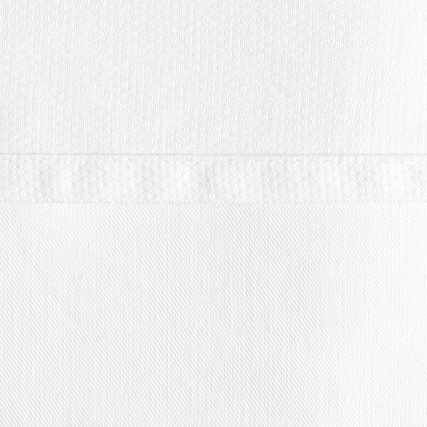A close-up of a white fabric table cover with a thin white birdseye border.