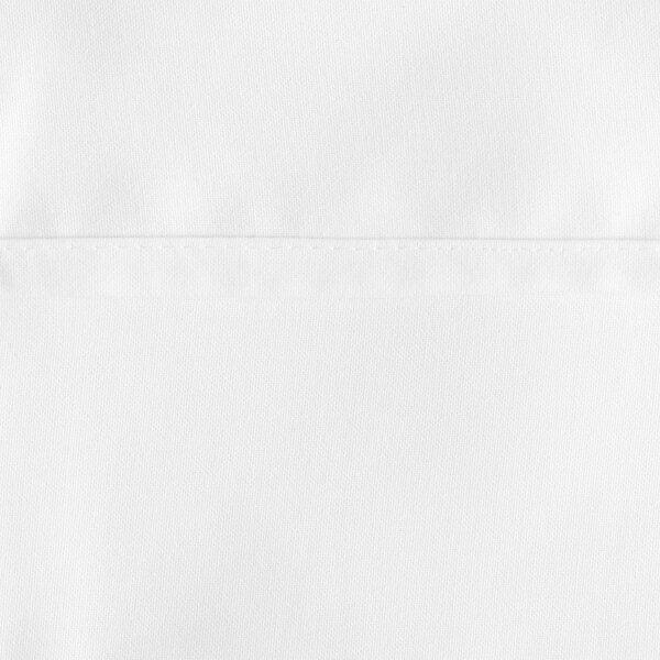 A close up of a white Oxford 100% spun polyester table cover.