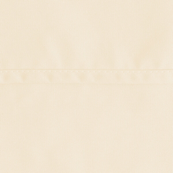 An ivory square table cover made of fabric.