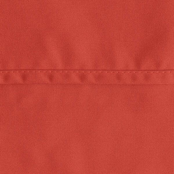 A close-up of a rust-colored Oxford 100% spun polyester table cover.