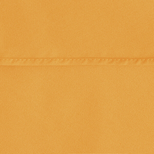 A close up of a gold Oxford fabric table cover.