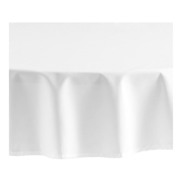 A white Oxford cloth table cover with a hemmed edge.