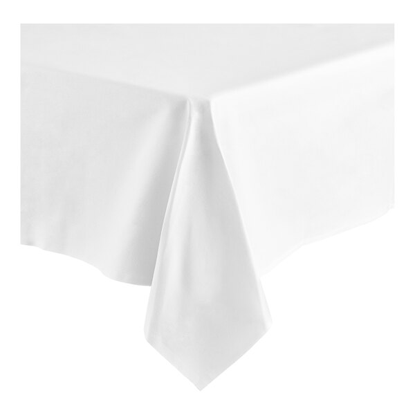 A close-up of a white Oxford Momie cloth table cover with a folded edge.