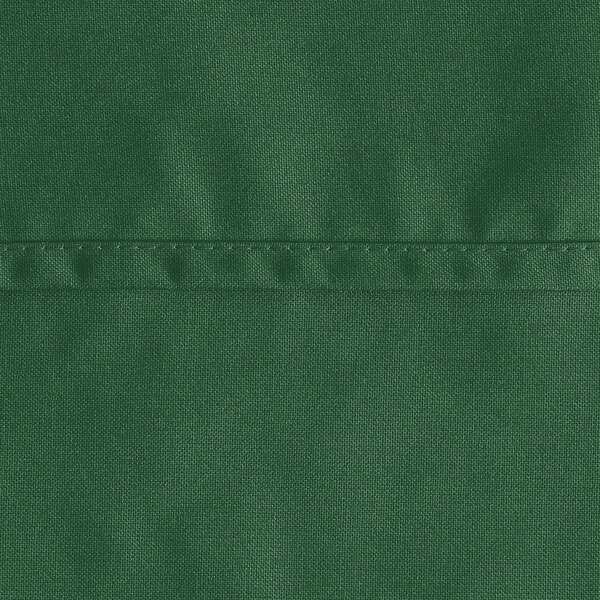 A close-up of a hunter green Oxford cloth table cover.