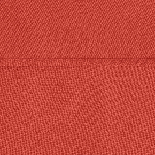 A red Oxford cloth table cover with a white hemmed edge.