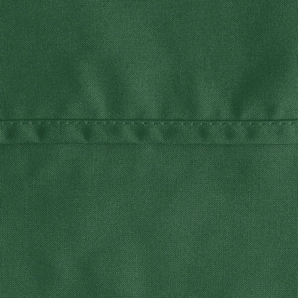 A close-up of a hunter green Oxford square table cloth.