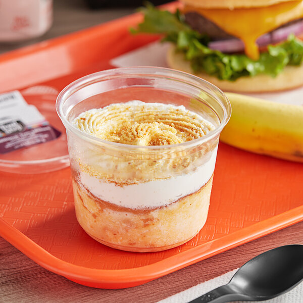 A plastic tray with 8 Our Specialty Treat Shop Traditional Tres Leches Cake Cups.