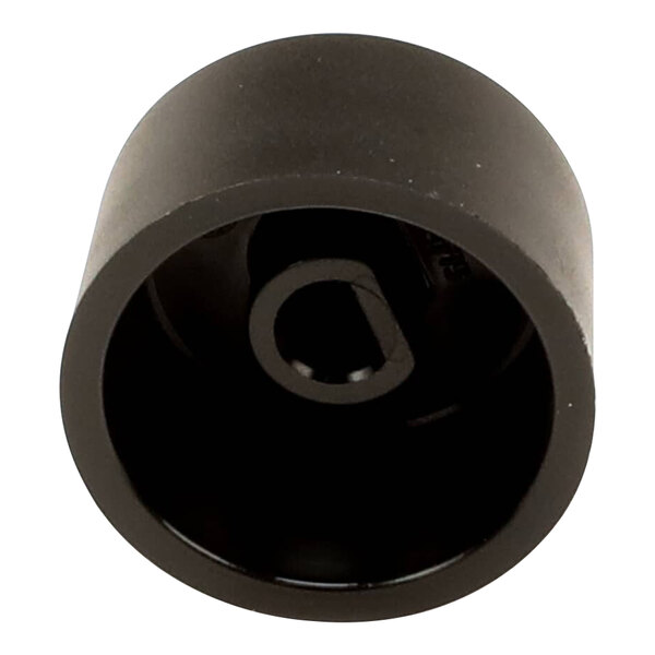A black plastic wheel with a hole in the center.