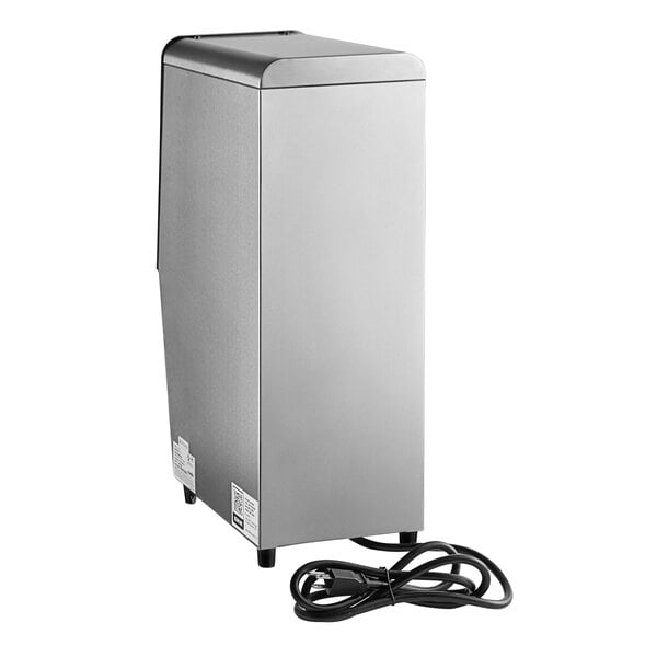 A silver rectangular Estella Caffe hot water dispenser with a black cord.