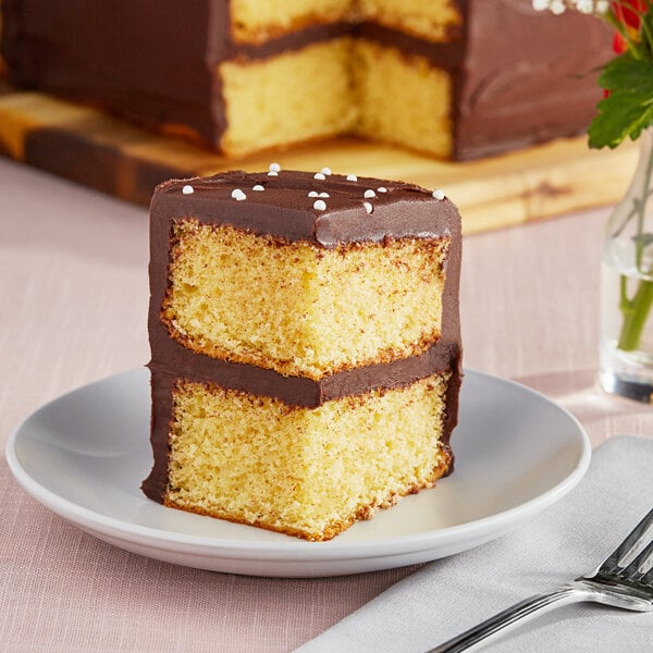 A slice of Rich's un-iced sponge cake on a plate.