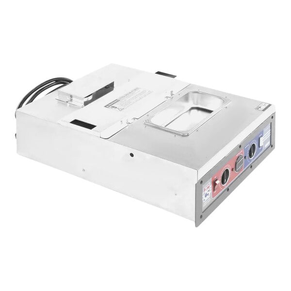 A silver rectangular Metro RPC5-CM2000 combo module with buttons and wires.