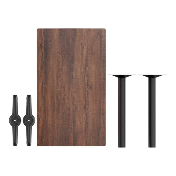 A Lancaster Table with metal legs and a rectangular wood surface.