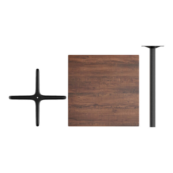 A Lancaster Table & Seating bar height table with a walnut textured top and black metal base.