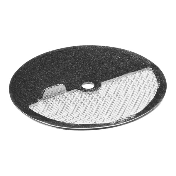 A circular metal vent screen with holes.
