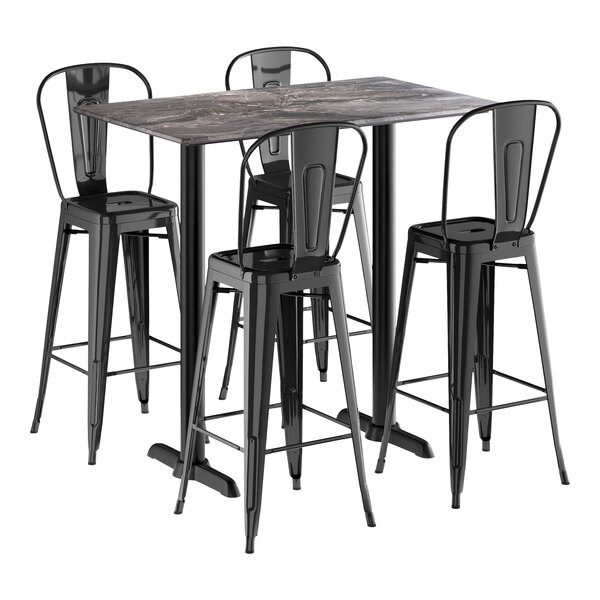 A Lancaster Table & Seating black metal bar table with four black barstools.