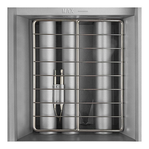 A stainless steel Avantco gas fryer with cylindrical metal objects inside.