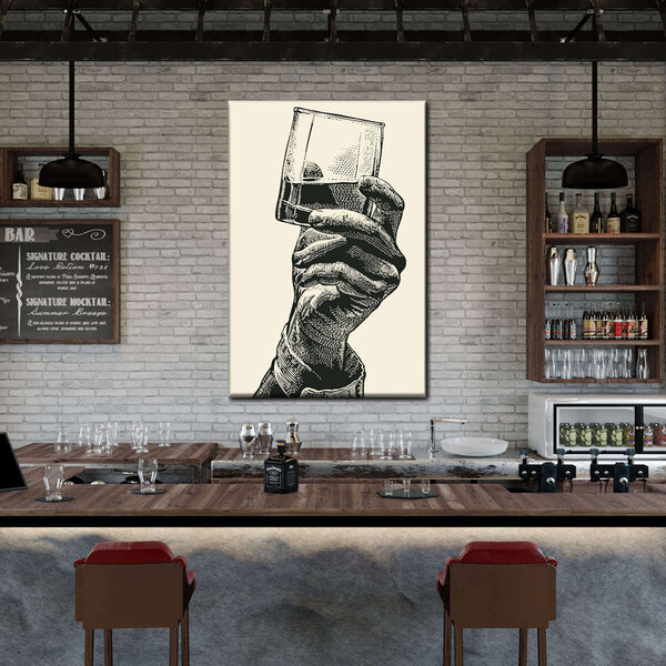 A 30" x 45" canvas wall art of a hand holding a glass of whiskey.