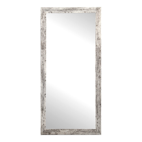 A rectangular mirror with a distressed white wooden frame.