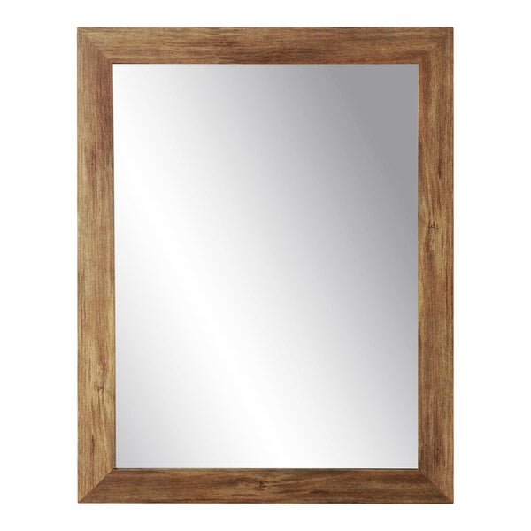 A BrandtWorks mirror with a wooden frame.