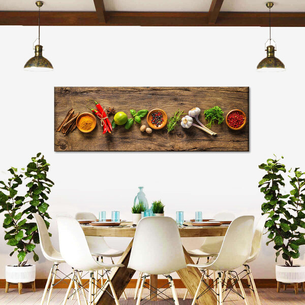 A white canvas wall art with elephant and flavorful spices and herbs.