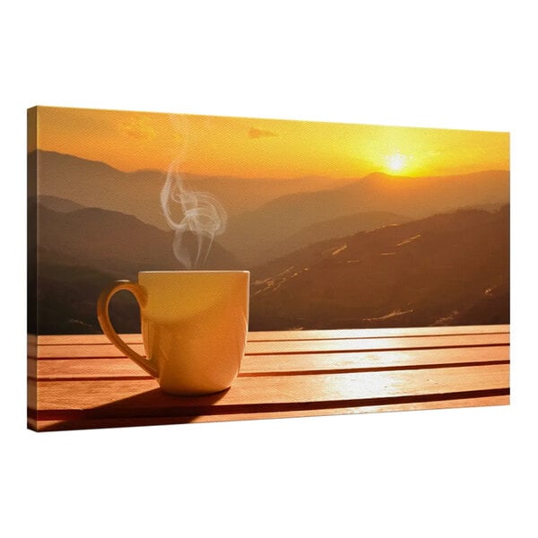 Elephant Stock canvas wall art of a coffee cup on a table at sunset overlooking mountains.