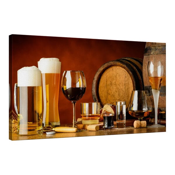 A canvas wall art print of wine and beer glasses on a table with a barrel.