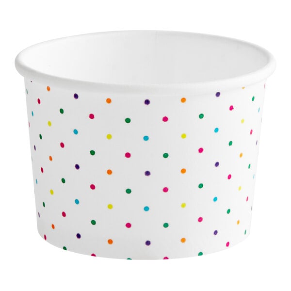 A white paper cup with colorful dots.