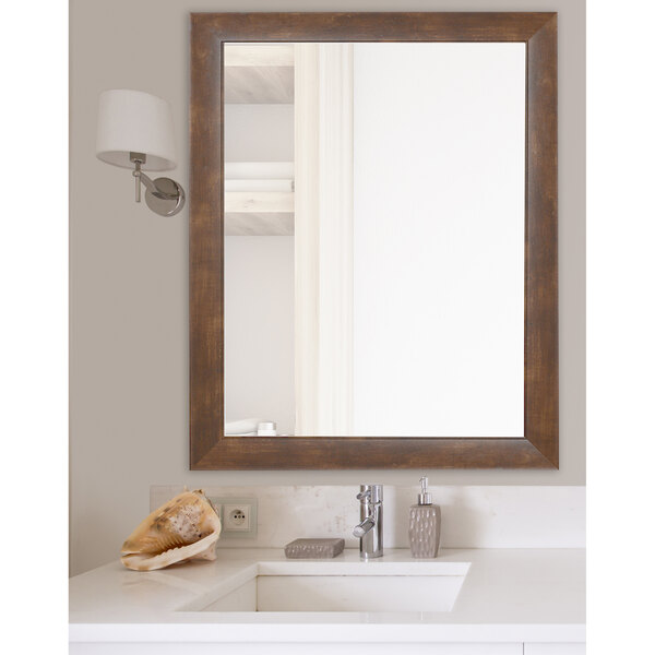 A BrandtWorks mocha walnut brown wood mirror.