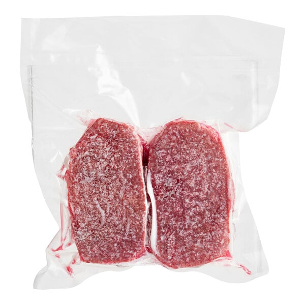 A bag of Chunk Foods plant-based vegan steak containing two raw meat patties.