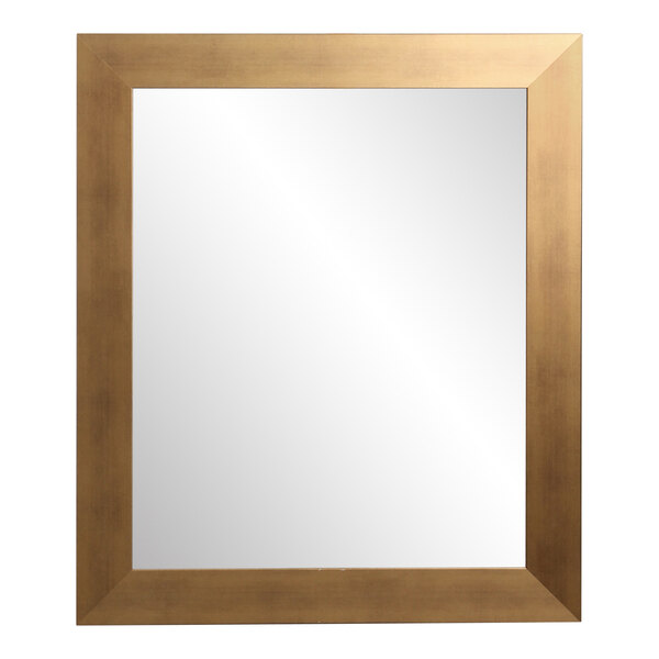 A BrandtWorks mirror with a brushed gold frame.