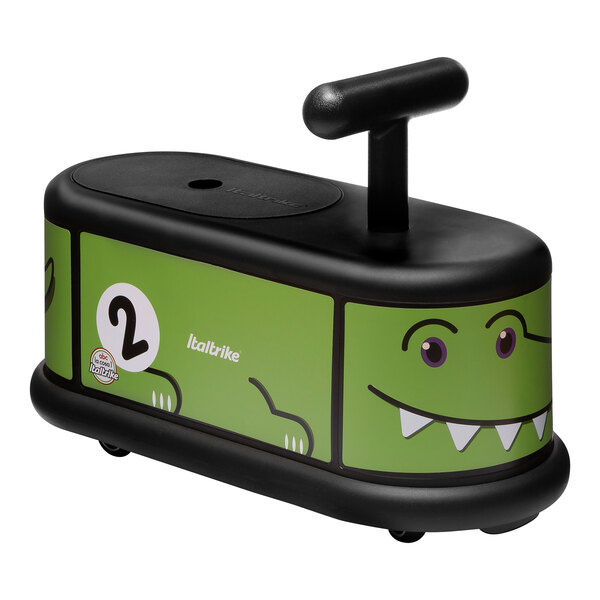 An Italtrike La Cosa Crocodile ride-on toy with green and black colors.