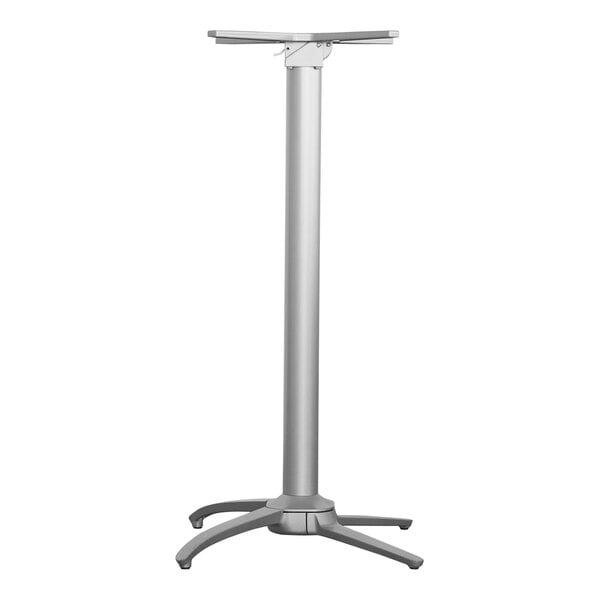 A metallic silver powder-coated aluminum table base with a white pole and silver stand.