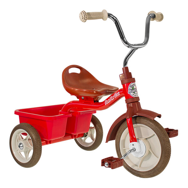A red Italtrike tricycle with a basket on the front.