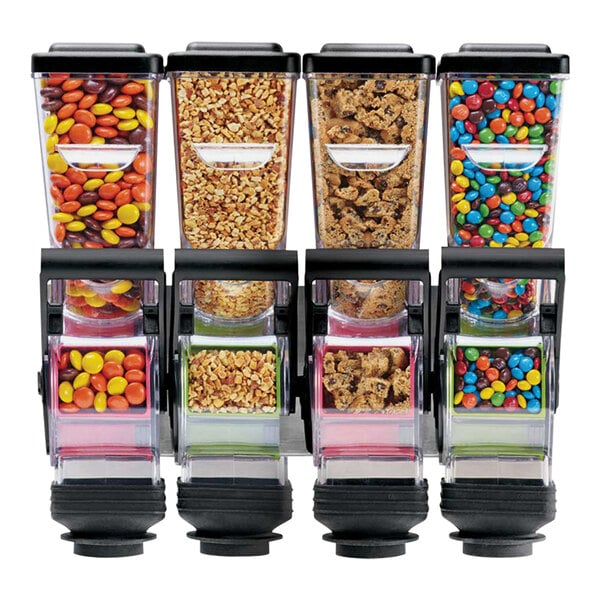 A Server SlimLine wall-mount dispenser with four containers of different candies.