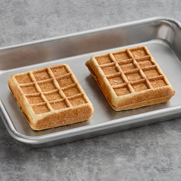 Le Chic Patissier custard cream-filled waffles on a tray.