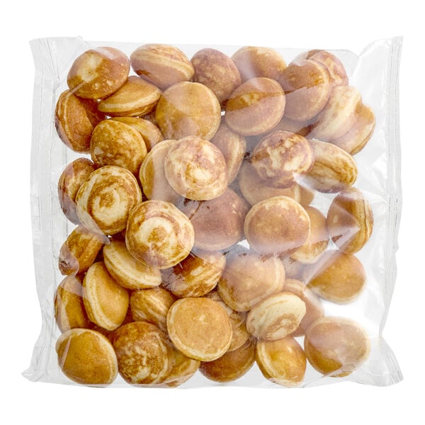 A bag of small round brown Le Chic Patissier Mini Dutch Pancakes.