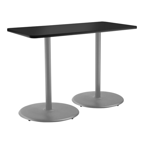 A black rectangular National Public Seating cafe table with a gray frame and round metal base.
