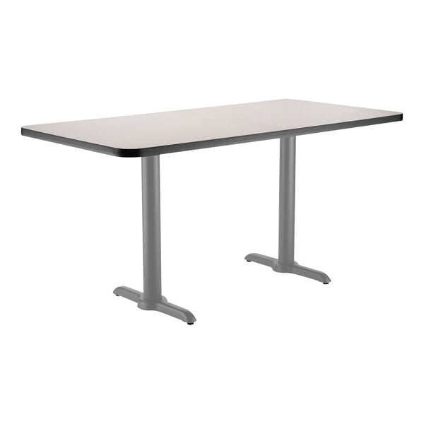 A National Public Seating rectangular table with a gray T base.