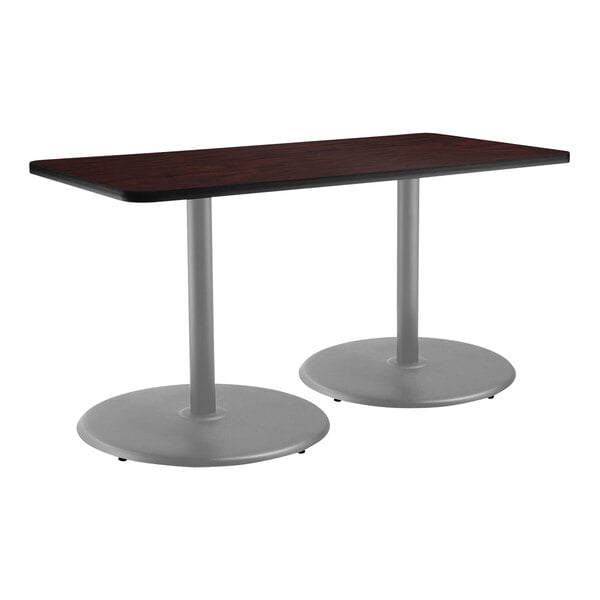 A National Public Seating mahogany rectangular table with a gray metal base.