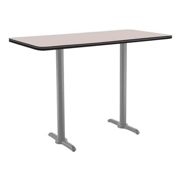 A rectangular National Public Seating table with a gray and black T base.