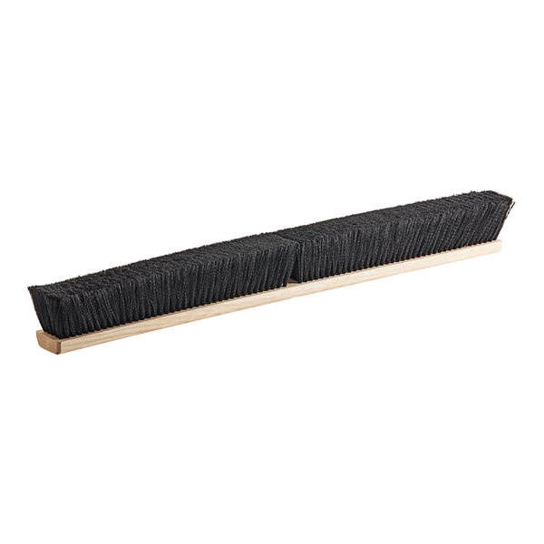 A black Lavex wood push broom head with flagged bristles.