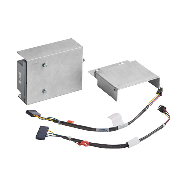 A metal ignition module service kit with two wiring harnesses and a mounting bracket, all laid out on a white background.