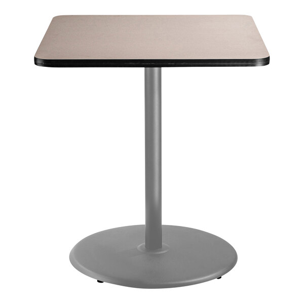 A National Public Seating bar height table with a gray top and metal base.