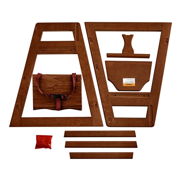 A wooden high chair with a red harness.