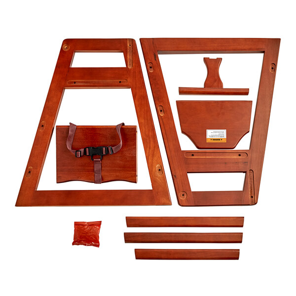 A wooden Lancaster Table & Seating high chair unassembled.