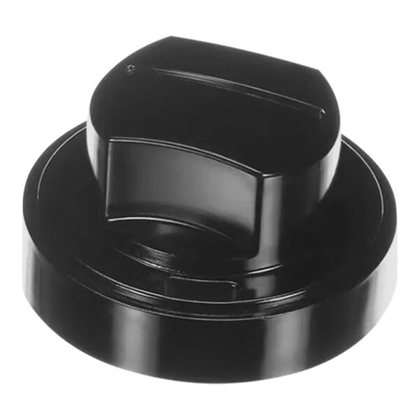 A close up of a black plastic knob.