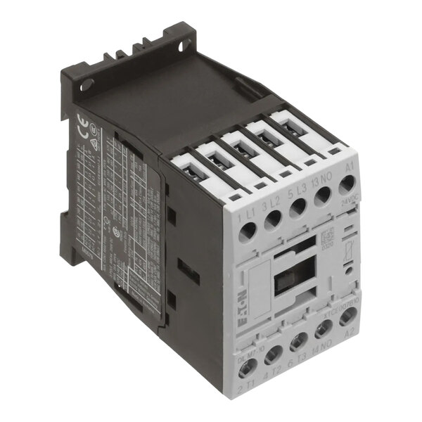 A black electrical device with four switches.